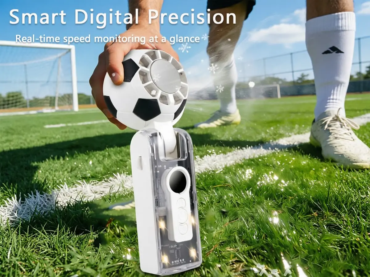 Person holding an X68 soccer fan on a sports field for cooling