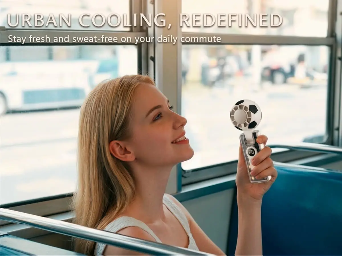 A woman staying cool with an X68 soccer fan during her daily commute